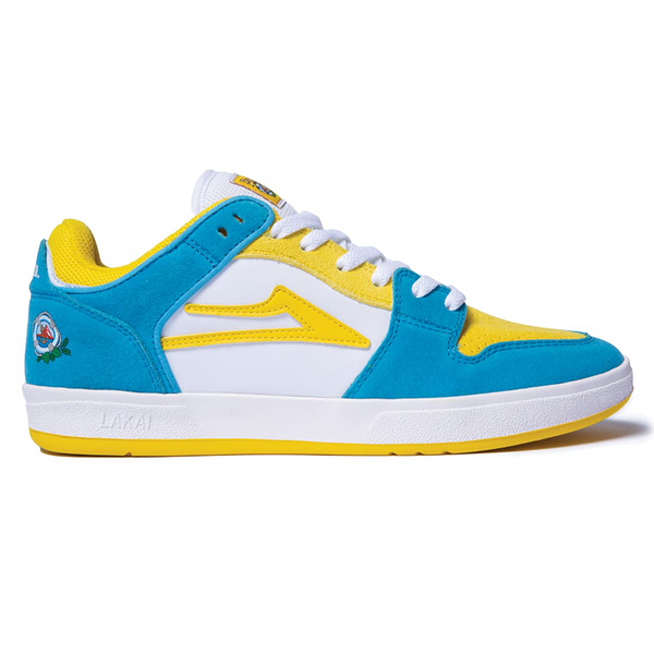 A pair of blue LAKAI X PACIFICO TELFORD LOW WHITE/CYAN SUEDE sneakers with yellow accents and LAKAI logo.