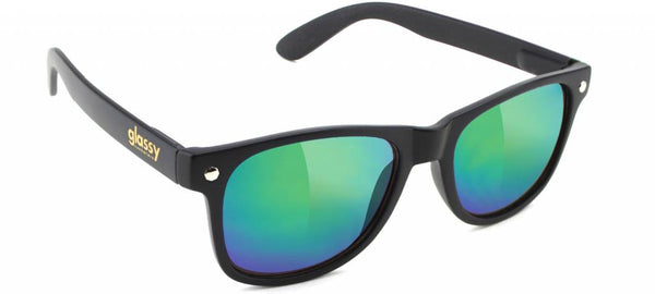 A pair of GLASSY SUNHATERS LEONARD MATTE BLACK sunglasses with green mirrored lenses.
