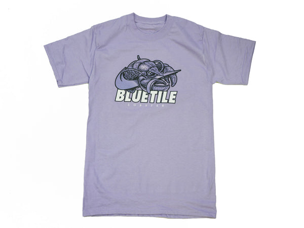 A Bluetile Skateboards purple t-shirt with the word BLUETILE PURPLE LOBSTER T-SHIRT on it.