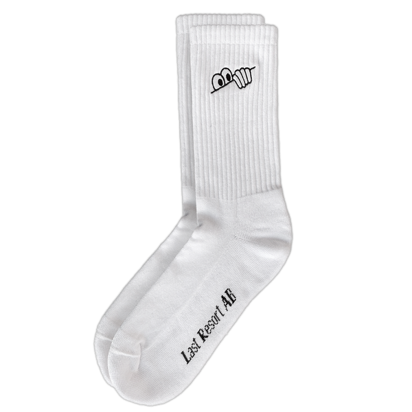 A LAST RESORT AB EYE SOCKS WHITE with the text "just do it" parodied as "just recruit ai" and an emblem resembling a fist bump near the cuff, from Last Resort AB.