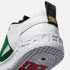 A DC LYNX OG LUXE PACK WHITE/GREEN shoe with DC shoes logos on it from the DC LYNX OG Luxe Pack.