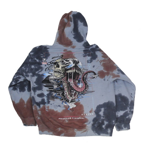 The PRIMITIVE VENOM HOODIE WASHED BLUE by PRIMITIVE features a striking Venom skull graphic on the back, plus "Primitive x Marvel" and distinctive text accents.