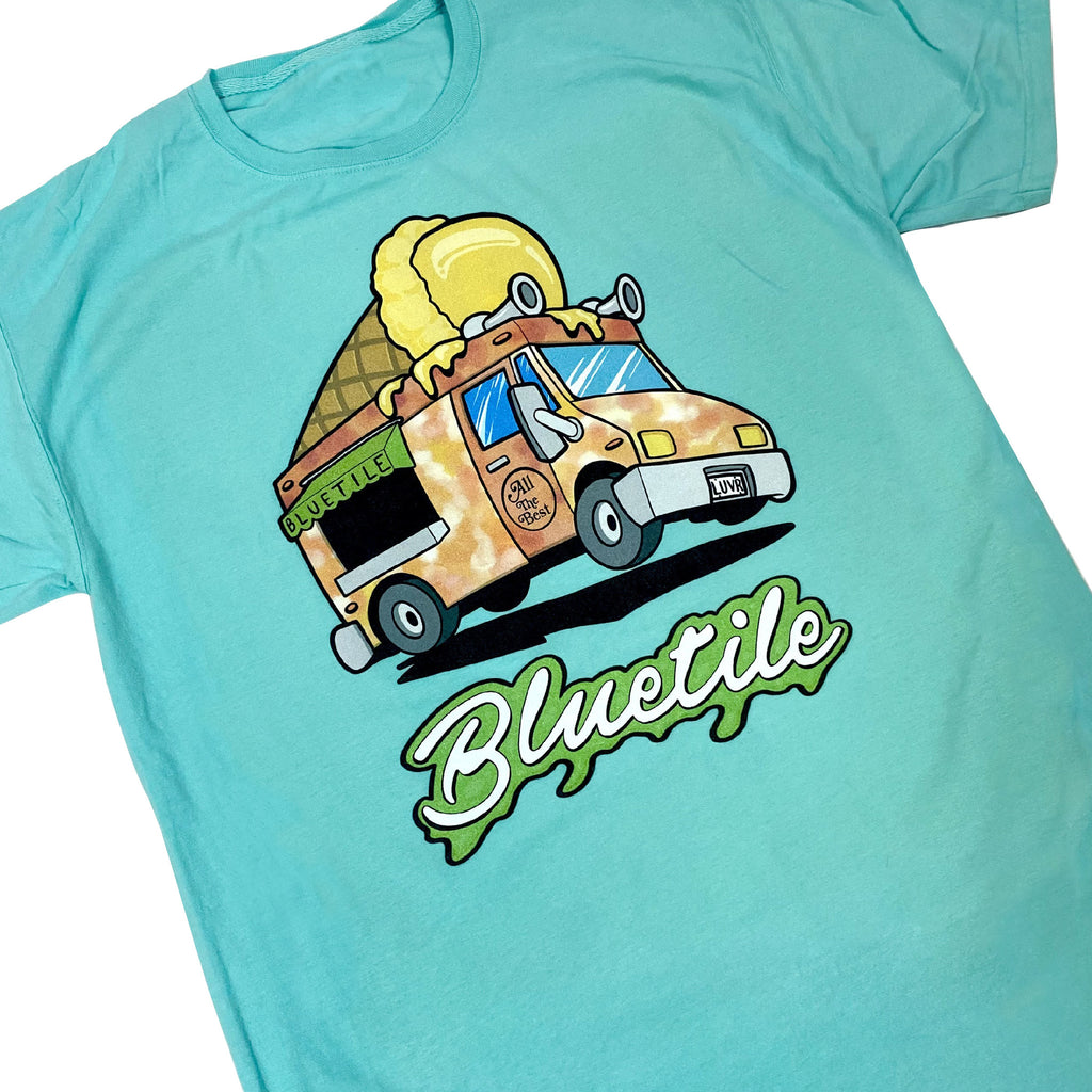 A BLUETILE MUNCHIES DELIVERY T-SHIRT MINT with a blue truck on it, perfect for delivery drivers or fans of trucks.