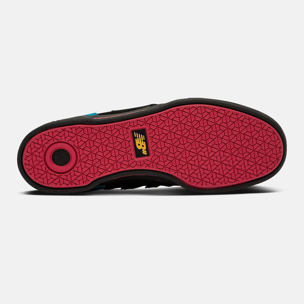 A black and pink NB NUMERIC 288 SPORT shoe with a red sole.