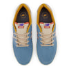 A pair of NB NUMERIC 425 BLUE / CREAM sneakers in blue and orange, specifically designed with the NB numeric logo.