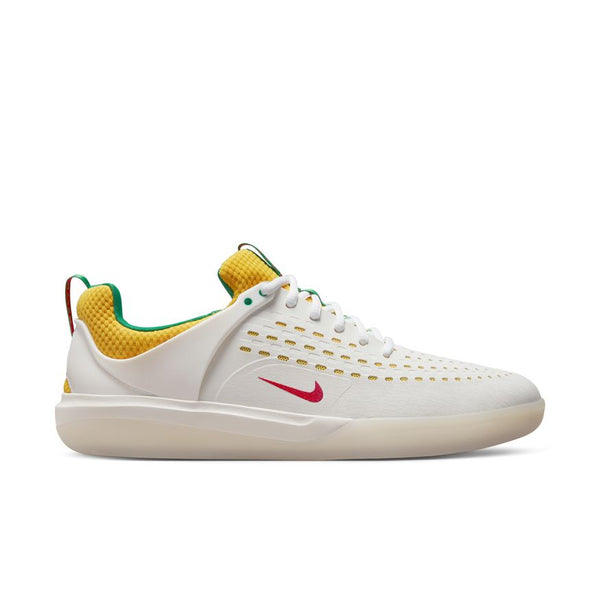 The nike SB NYJAH 3 PRM in Summit White/Black-Tour Yellow features a white upper, yellow tongue and lining, green accents, perforated sides, and a pink swoosh—ideal for skateboarding—shown in side profile.