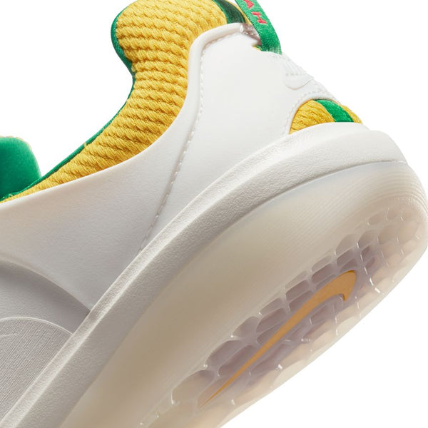 Close-up of the heel of a nike SB NYJAH 3 PRM in Summit White/Black-Tour Yellow, with yellow textured fabric, green trim, and a translucent sole—perfect for skateboarding in Columbia, SC.