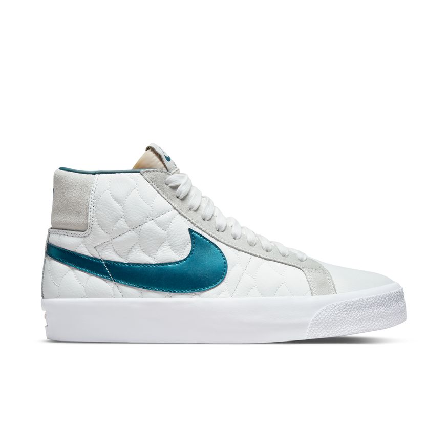 The NIKE SB KOSTON BLAZER MID SUMMIT WHITE / NIGHTSHADE-WHITE in white and teal is a stylish and trendy shoe that will elevate your sneaker game. Its sleek design features the iconic Nike logo, adding a touch of sporty sophistication to.