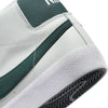 A close up of a white and green Nike SB Blazer Mid ISO Orange Label White/Pro Green sneaker.