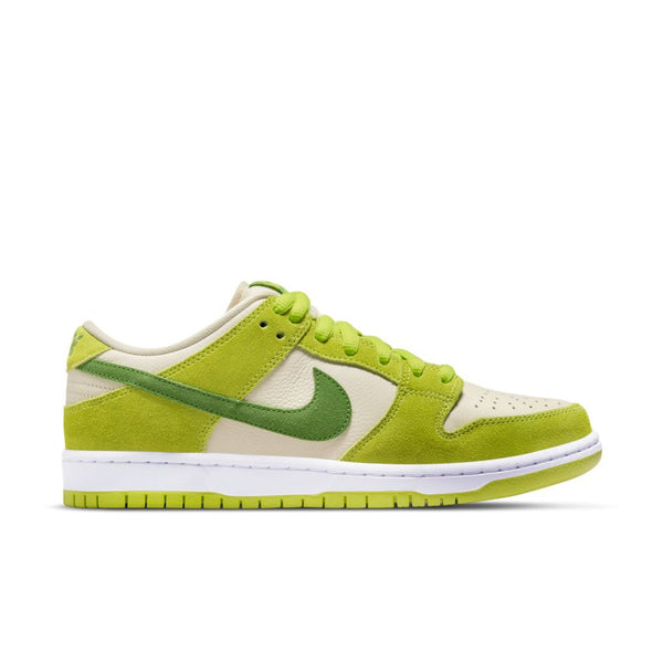 A side view of the NIKE SB DUNK LOW PRO ATOMIC GREEN/CHLOROPHYLL sneaker, featuring green suede and white leather panels, a green Nike swoosh, a white midsole, and a green outsole.