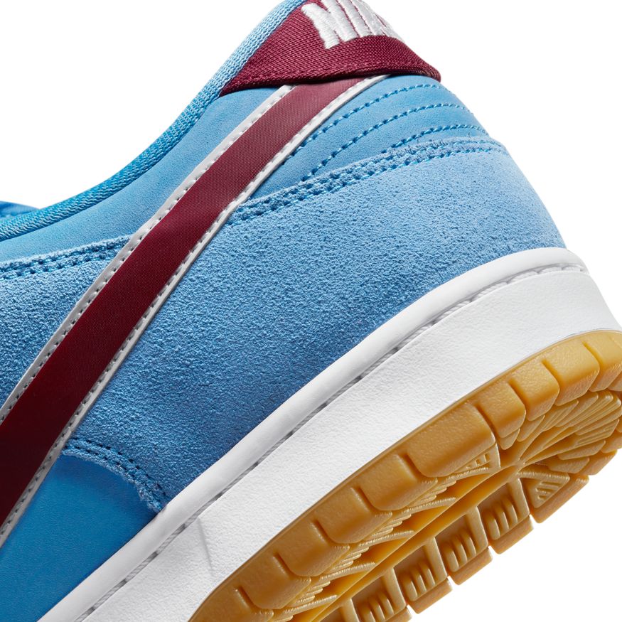 The NIKE SB DUNK LOW PRO "PHILLIES" VALOR BLUE/TEAM MAROON/WHITE is the perfect sneaker for MLB fans of the Philadelphia Phillies, with hints of maroon adding a touch of team spirit.
