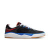 The NIKE SB x NBA ISHOD PRM BLACK / UNIVERSITY RED-HYPER ROYAL swoosh is black with red and blue accents.
