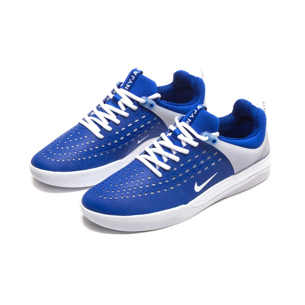 A pair of NIKE SB NYJAH 3 GAME ROYAL / WHITE shoes on a white background.