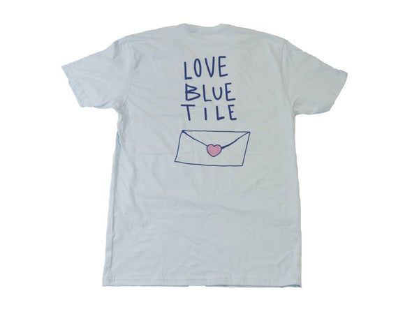 Irving Juarez designed the BLUETILE LOVE LETTER T-SHIRT LIGHT BLUE tee as part of his artist series for Bluetile Skateboards.