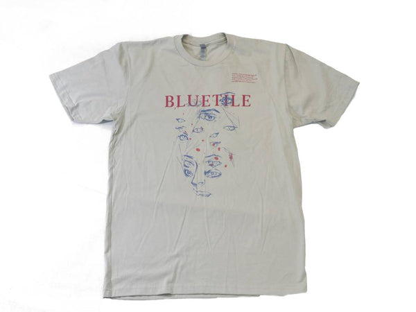 An artist series BLUETILE EYES T-SHIRT LIGHT GREY featuring the word bluefleet, designed by Irving Juarez from Bluetile Skateboards.