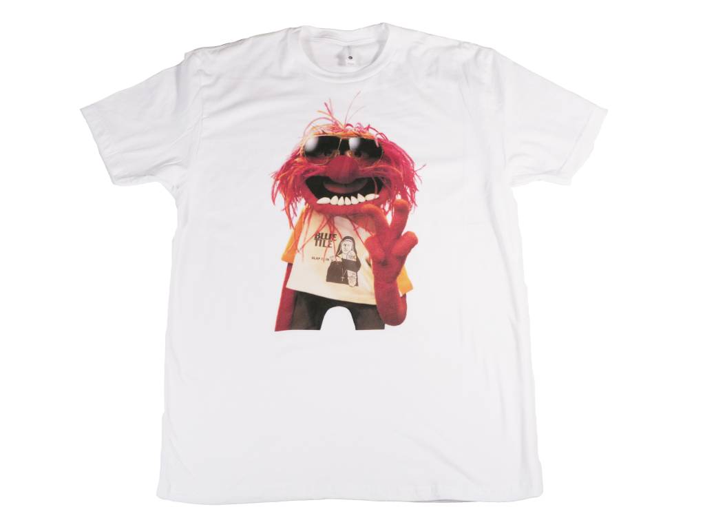 A Bluetile Skateboards white t-shirt with an image of a red monster wearing sunglasses.