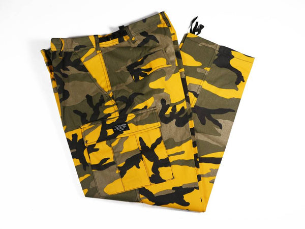 A pair of Bluetile Surplus Cargo Pant Stinger Yellow by Bluetile Skateboards.
