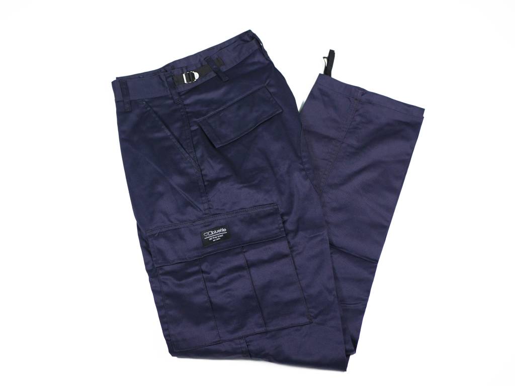 A pair of Bluetile Surplus Cargo Pant Navy from Bluetile Skateboards on a white background.