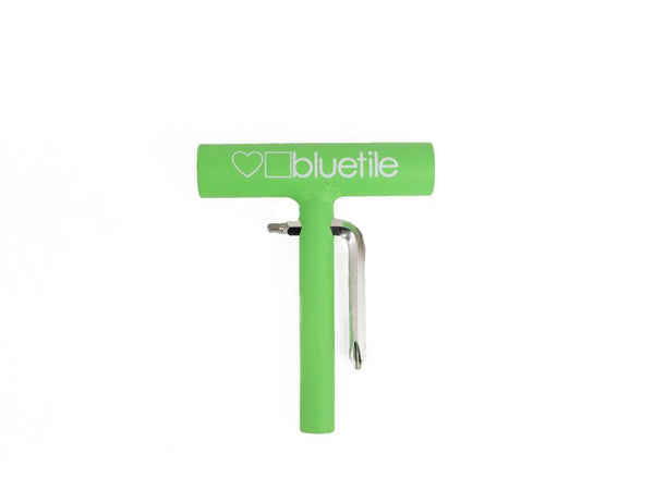 A green BLUETILE SKATE TOOL GREEN with the word Bluetile Skateboards on it.