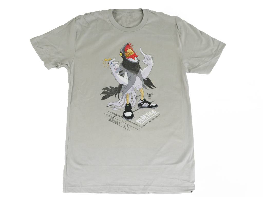 A Bluetile Skateboards t-shirt with a cartoon rooster on it, perfect for casual wear or as a unique addition to any Nike SB Dunk Low sneaker collection.
