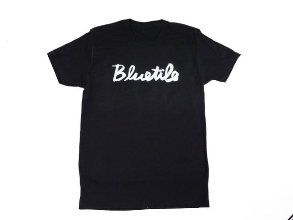 A BLUETILE CURSIVE T-SHIRT BLACK / WHITE with the word 'blush' on it.