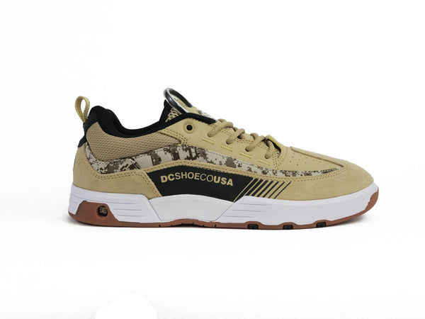 A beige and black DC SHOES LEGACY 98 SLIM IQUI DIGI CAMO sneaker with a snake print by DC.