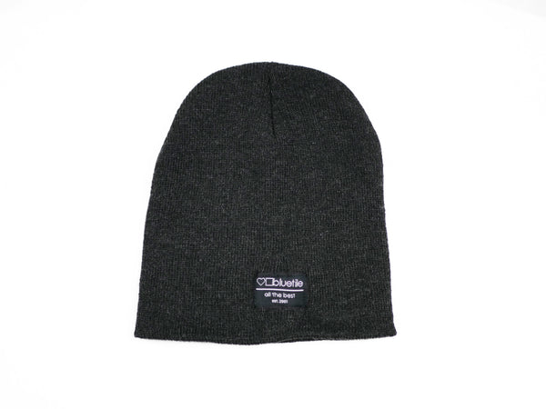 A Bluetile Skateboards BLUETILE SURPLUS UNCUFF BEANIE DARK GREY on a white background.