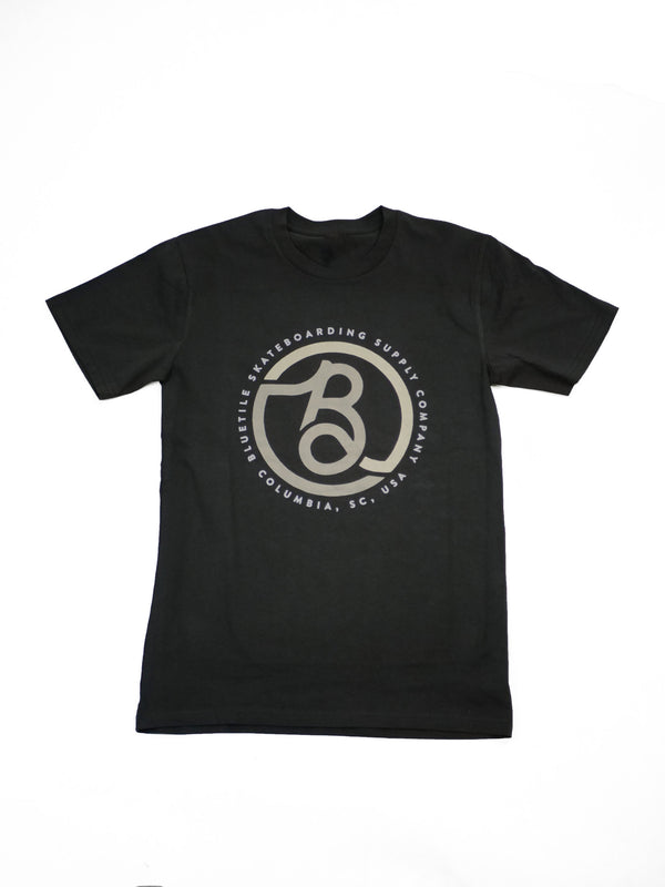 A Bluetile Skateboards coal grey t-shirt with the letter B on it.