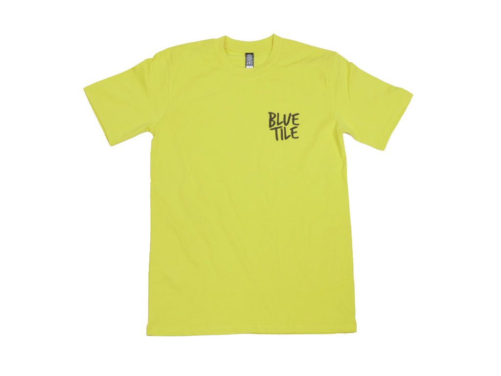 A yellow BLUETILE YUPYUK TOTEM T-SHIRT GOLD with a black logo featuring the TOTEM design.