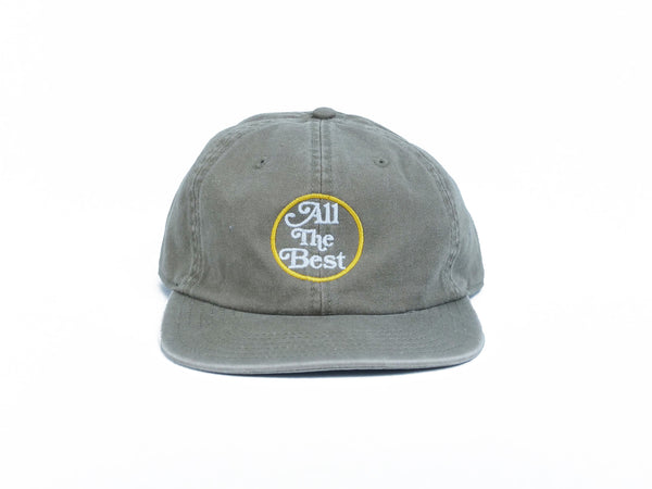 A Bluetile Skateboards unstructured hat with the words "all the best" on it.