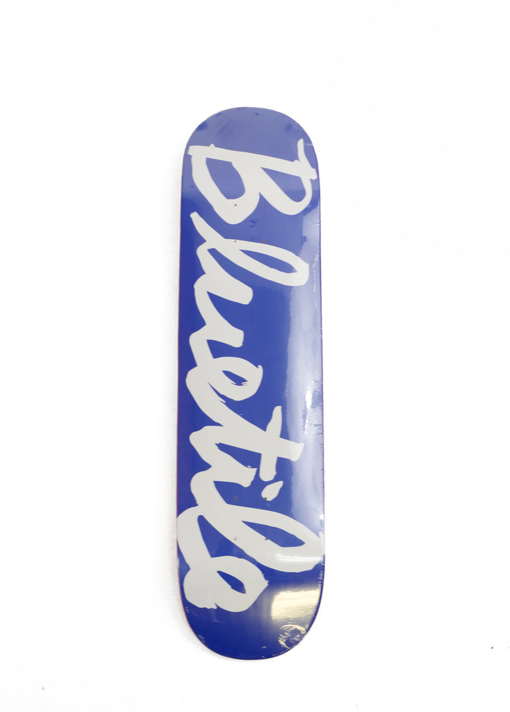 A BLUETILE CURSIVE LOGO BLUE skateboard with white Bluetile Skateboards logo on it.