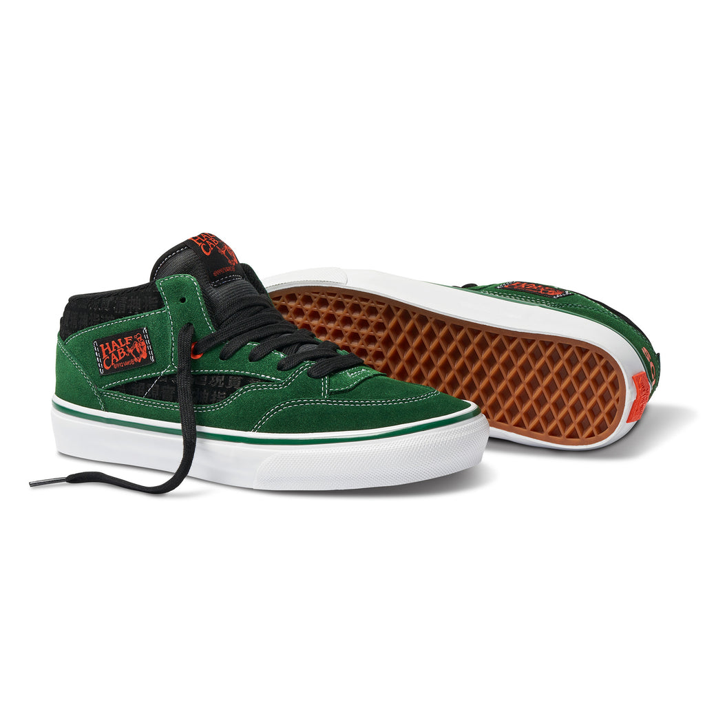 A pair of VANS SKATE X SCI-FI FANTASY HALF CAB '92 VCU GREEN / WHITE shoes on a white background.