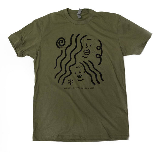 An Exclusive to Bluetile Skateboards green t-shirt featuring two women with long hair.