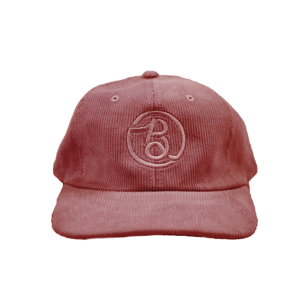 A Bluetile Skateboards corduroy hat with the letter b on it.