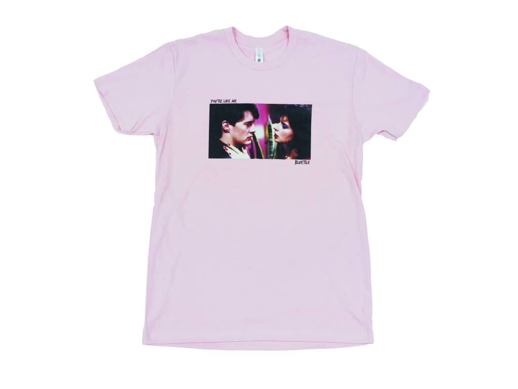 A women's Bluetile Skateboards "LIKE ME" pink t-shirt with a photo of two people.