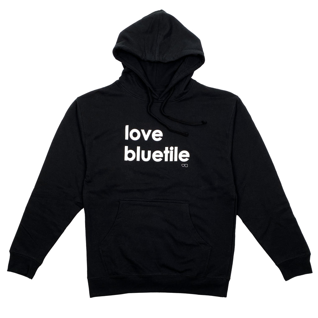 A Bluetile Skateboards black hoodie with the words BLUETILE LOVE BLUETILE printed on it.