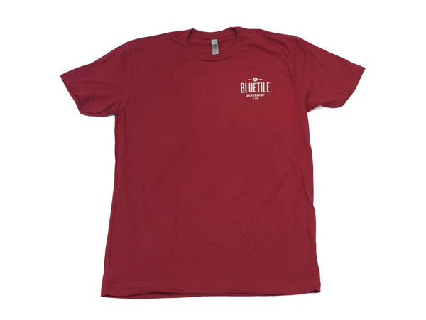 A BLUETILE SINCE 2001 SHIRT - GARNET / WHITE with a white logo design made by Bluetile Skateboards.