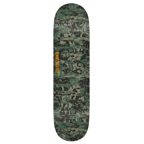 A REAL BUSENITZ FIELD ISSUE skateboard deck by REAL, 8.25" wide, features a green digital camouflage pattern and bold yellow "REAL SKATEBOARDS" text on one side.