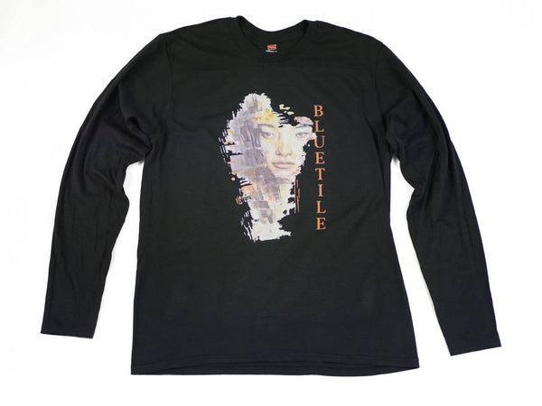 An Bluetile Skateboards artist series black long sleeve t-shirt with an image of a woman.
