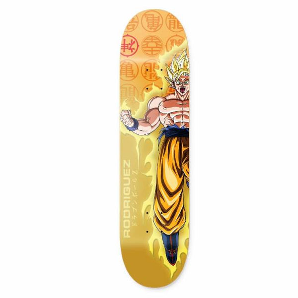 The PRIMITIVE X DBZ RODRIGUEZ GOKU POWER UP skateboard deck features a dynamic illustration of golden-haired Goku in action with a glowing aura and Japanese symbols in the background. Available in various sizes.