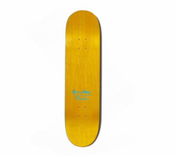 The PRIMITIVE X RICK & MORTY PICKLE RICK skateboard deck by PRIMITIVE features subtle blue graphics and text on a plain yellow surface, showcased against a clean white background.