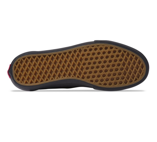 A VANS OLD SKOOL PRO BLACKOUT skate shoe with a gum sole.