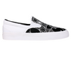 The CONVERSE CONS ONE STAR CC SLIP WHITE / BLACK / WHITE is a stylish slip-on sneaker that features a bold black and white colorway, with spider webs adding an edgy touch.