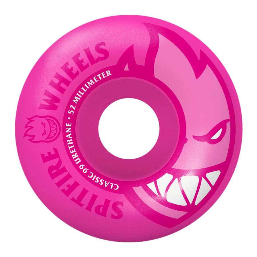 A SPITFIRE Classic Neon Bigheads 99D 52mm pink skateboard wheel with teeth on it.