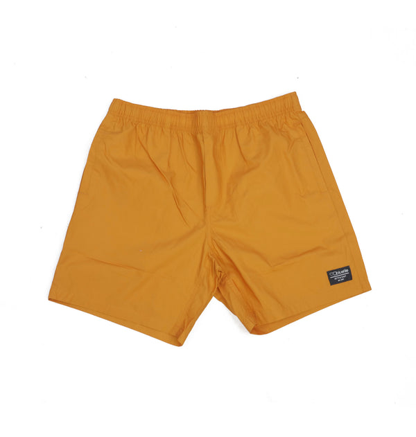A pair of yellow BLUETILE SURPLUS BEACH SHORT ORANGE shorts on a white background.