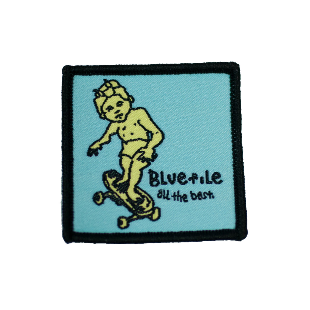 A BLUETILE SKETCHY GONZ PATCH with an image of a boy riding a skateboard. (Product: BLUETILE SKETCHY GONZ PATCH, Brand: Bluetile Skateboards)