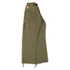 A Deluxe SPITFIRE BIGHEAD FILL PANT OLIVE with a yellow emblem on the side.