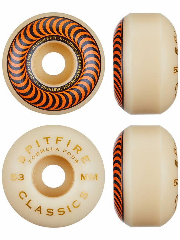 Four SPITFIRE F4 CLASSIC 101D 53MM wheels by SPITFIRE shown from top and side angles, featuring an orange and black swirl on one side and gold text on the other.