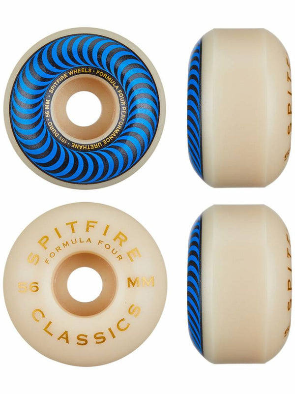 Four SPITFIRE F4 CLASSIC 101D skateboard wheels, 56MM, are displayed from various angles, showcasing their blue spiral design and classic lettering.