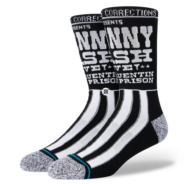 A pair of black and white novelty Stance socks with text design resembling an eye chart.